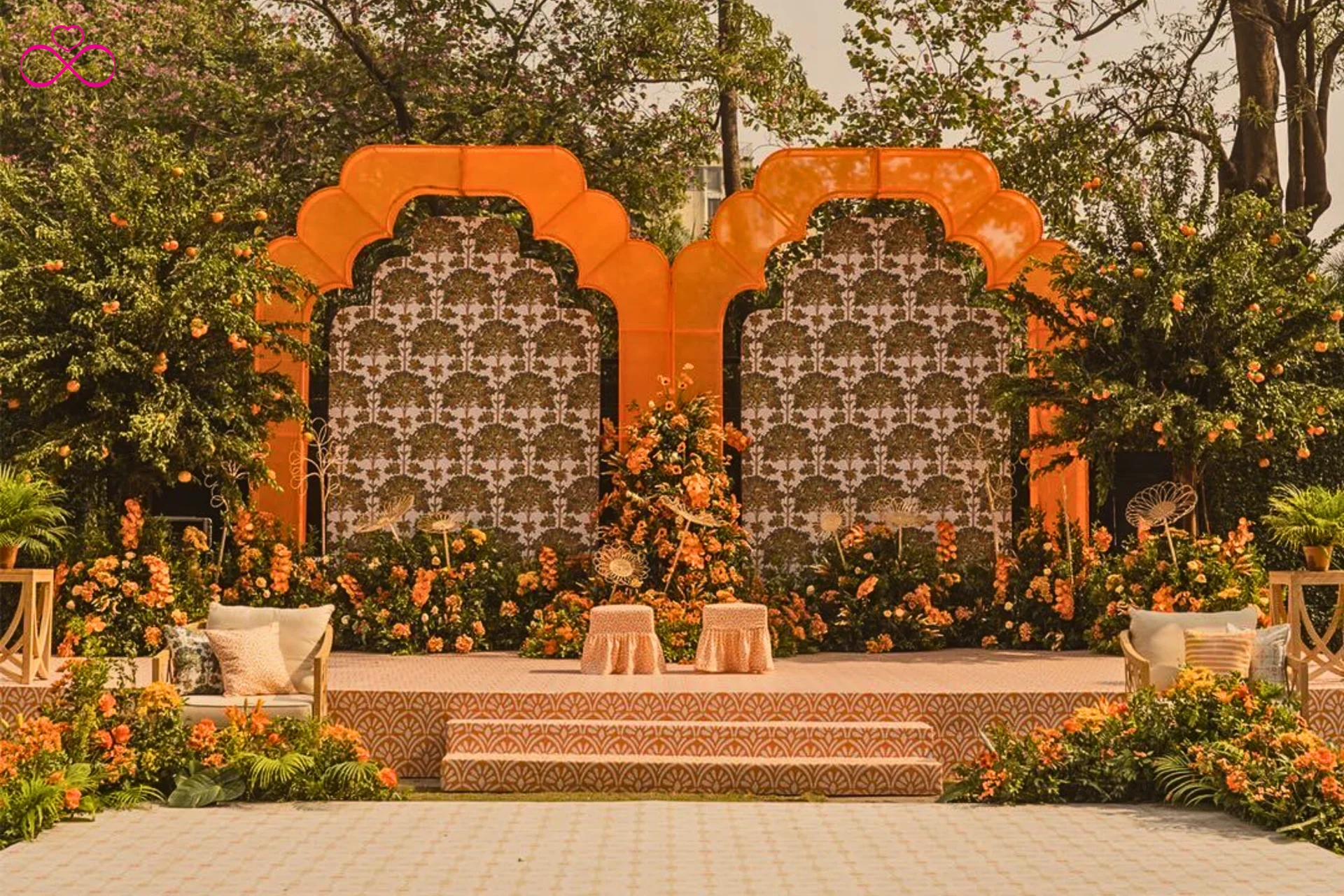 Terracotta and ivory mehendi ceremony theme decor 2026 earthy Indian wedding clay pots linen