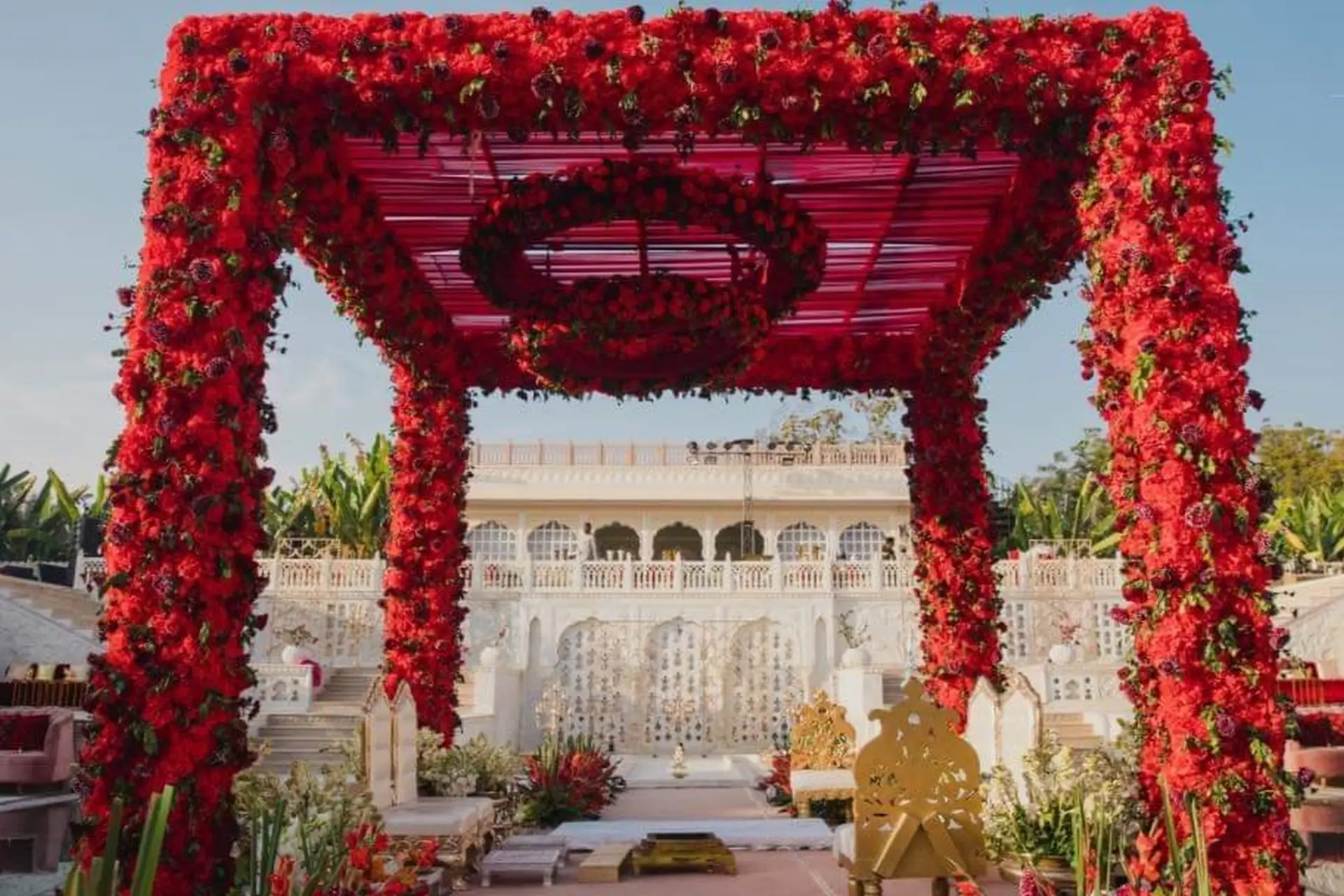Lavish Rose Draped Mandap Decor  by Mpire Weddings