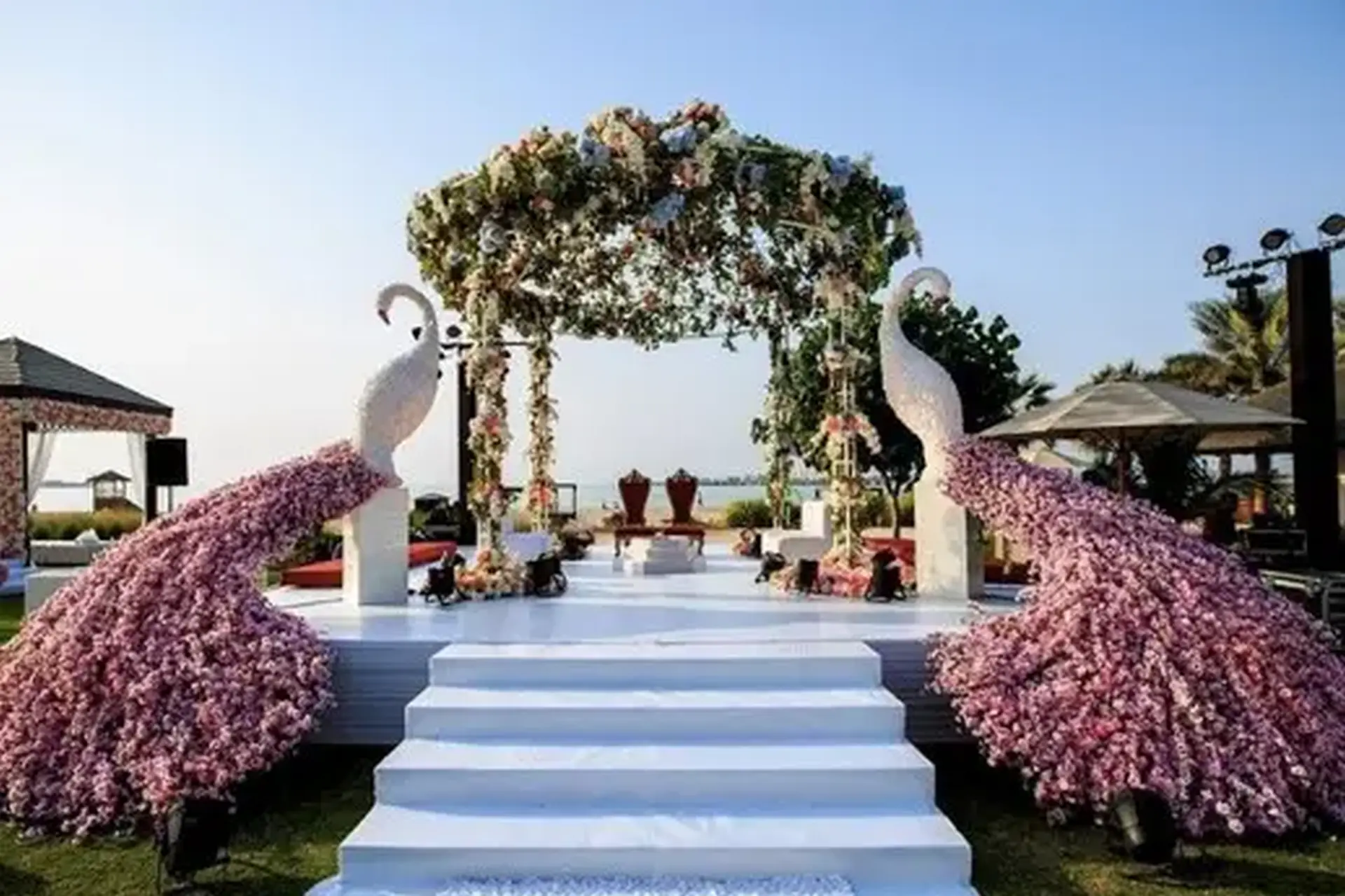 Fabulous Peacock carved Mandap Decor by  Vogue Event & Entertainment